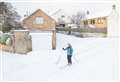 Moray woman overcomes snowy conditions by skiing through Elgin