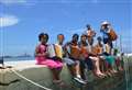 Moray accordion player invited to Caribbean to teach kids