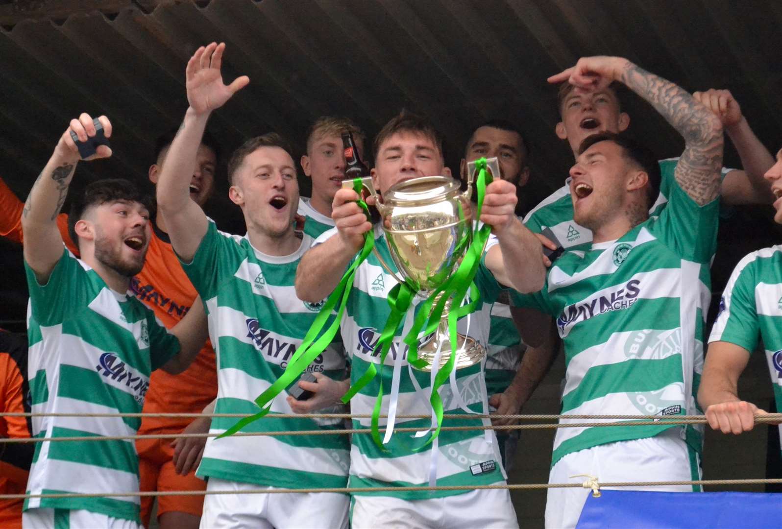 Jack Murray, holding the trophy, is joined by (left to right) Liam Harvey, Dale Wood and Darryl McHardy. Picture: Tyler McNeill