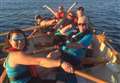 Coastal rowing club in Moray on the crest of a wave